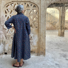 Load image into Gallery viewer, Back side of model with blue printed kaftan dress in Amber Palace Jaipur