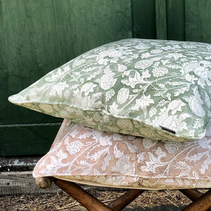 Two block printed pillows in green and beige