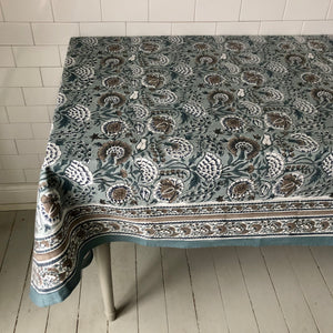 Table set with blockprinted tablecloth in bluegrey and brown