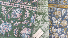 Load image into Gallery viewer, Three fabric swatches with intricate floral and botanical block prints are displayed side-by-side. The top swatch is sage green with floral motifs; the middle is white with green botanical patterns and a white brand tag reading {aHILL}; the bottom is slate blue with golden yellow and white floral designs.