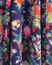 Load image into Gallery viewer, Navy blue fabric with colorful floral pattern
