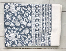 Load image into Gallery viewer, Folded tablecloth with indian flower print in blue and white